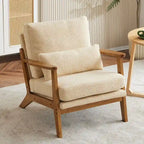 Poltrona d'accento rivestita in misto lino con gambe in legno e un cuscino, beige