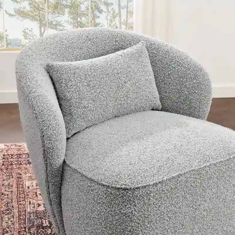 Poltrona girevole accentata in tessuto bouclé Sherpa