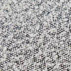 Poltrona girevole accentata in tessuto bouclé Sherpa