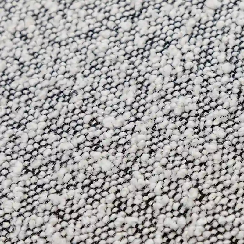 Poltrona girevole accentata in tessuto bouclé Sherpa