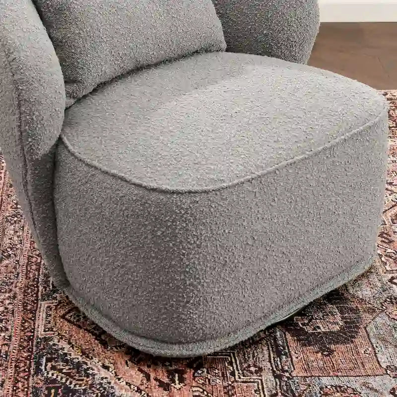 Poltrona girevole accentata in tessuto bouclé Sherpa