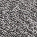 Poltrona girevole accentata in tessuto bouclé Sherpa